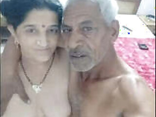 Indian old man with teen girl