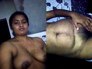 Indian wife shows her naked assets on camera