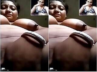 A horny Desi Budi jerking off with her fingers.